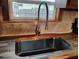 Modern kitchen sink with stainless steel basin and stylish faucet at 718 New York St, Clearwater, FL 33756