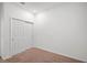 Empty bedroom with double door closet at 9474 Sanders Park Pl, Seffner, FL 33584