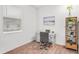 Bright home office features a desk, chair, and window at 9474 Sanders Park Pl, Seffner, FL 33584