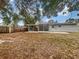 Large backyard with screened patio and privacy fence at 2044 27Th W Ave, Bradenton, FL 34205