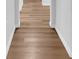 Hallway with light brown wood-look floors at 2044 27Th W Ave, Bradenton, FL 34205