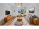 Bright living room featuring hardwood floors and comfy seating at 2044 27Th W Ave, Bradenton, FL 34205