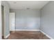 Simple bedroom with a closet and an exterior door at 4212 Empire Pl, Tampa, FL 33610