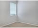 Bright bedroom with neutral walls and carpeted floor at 706 Fern Leaf Dr, Ruskin, FL 33570