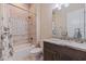 Clean bathroom with tub, shower, and updated vanity at 988 47Th N Ave, St Petersburg, FL 33703