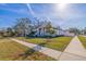 House exterior showcasing landscaping and curb appeal at 988 47Th N Ave, St Petersburg, FL 33703