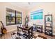 Home office with built-in shelving and large window at 988 47Th N Ave, St Petersburg, FL 33703