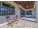 Relaxing covered patio with brick pavers and seating at 988 47Th N Ave, St Petersburg, FL 33703