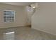 Spacious living room with tile floors and natural light at 2428 Roanoke Springs Dr, Ruskin, FL 33570