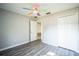 Spacious bedroom featuring grey flooring and double closets at 12600 Jillian Cir, Hudson, FL 34669