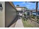 Front entrance with walkway leading to the front door of the house at 12600 Jillian Cir, Hudson, FL 34669