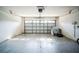 Spacious garage with overhead door and utility hookups at 12600 Jillian Cir, Hudson, FL 34669