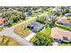 Aerial view of a single-Gathering home with a large backyard at 13474 Tune Ln, Spring Hill, FL 34609