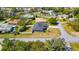 Aerial view of a house and surrounding neighborhood at 13474 Tune Ln, Spring Hill, FL 34609