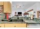 Kitchen sink and view into the living room beyond at 13474 Tune Ln, Spring Hill, FL 34609