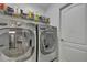 Convenient laundry room with washer and dryer included at 13474 Tune Ln, Spring Hill, FL 34609