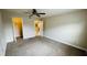 Bright bedroom with carpeted floors and ceiling fan at 2860 Somerset Park Dr # 203, Tampa, FL 33613