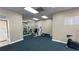 Fitness center with strength training equipment and a stationary bike at 2860 Somerset Park Dr # 203, Tampa, FL 33613