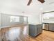 Living room features hardwood floors and kitchen island at 6941 Twilite Dr, Port Richey, FL 34668