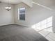 Bright dining room with carpet flooring and chandelier at 16617 Magnolia Reserve Pl, Wimauma, FL 33598