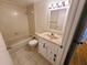 Bathroom with tub, toilet and vanity at 4034 Dream Oak Pl # 104, Tampa, FL 33613