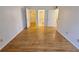 Bright bedroom with wood flooring and access to bathroom and closet at 4034 Dream Oak Pl # 104, Tampa, FL 33613