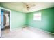 Needs renovation, features a ceiling fan and a window at 4119 Beacon Square Dr, Holiday, FL 34691