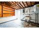 Unfinished garage with storage and utility sink at 4119 Beacon Square Dr, Holiday, FL 34691