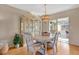 Bright dining room features a china cabinet and wood floors at 7213 19Th W Ave, Bradenton, FL 34209