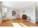 Bright living room with hardwood floors, large windows, and antique furniture at 7213 19Th W Ave, Bradenton, FL 34209