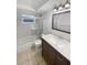 Clean bathroom with a shower/tub combo and vanity at 1414 Wickham Ln, Holiday, FL 34691