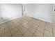Bright living room with tile floors at 1414 Wickham Ln, Holiday, FL 34691