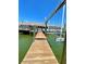 Wooden boat dock with lift and access to water at 514 Boca Ciega Point N Blvd, St Petersburg, FL 33708