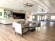 Spacious community room with seating and kitchen area at 514 Boca Ciega Point N Blvd, St Petersburg, FL 33708