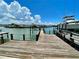 Wooden waterfront dock with boat slips at 514 Boca Ciega Point N Blvd, St Petersburg, FL 33708