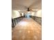 Large living room with tiled floors, currently under renovation at 514 Boca Ciega Point N Blvd, St Petersburg, FL 33708
