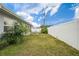 Fenced backyard with patio and lawn at 11095 56Th N Ave, Seminole, FL 33772