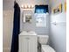 Bathroom with shower/tub combo, vanity, and window at 11095 56Th N Ave, Seminole, FL 33772