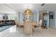 Bright dining room with a wood table and chairs at 11095 56Th N Ave, Seminole, FL 33772