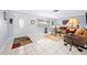 Living room entryway with tiled floors and a view of the living room at 11095 56Th N Ave, Seminole, FL 33772