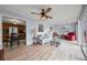 Sunroom boasts light flooring, seating area, and backyard access at 11095 56Th N Ave, Seminole, FL 33772