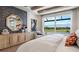 Main bedroom with large window, water views, and wood beam ceiling at 14451 Coastal Woodland Ln, Parrish, FL 34219