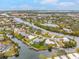 Wide aerial view of waterfront property with expansive canal views at 2322 Riverbluff Pkwy # V250, Sarasota, FL 34231