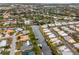 Aerial view of waterfront home community, showcasing the property's location and surrounding canals at 2322 Riverbluff Pkwy # V250, Sarasota, FL 34231