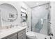 Bathroom with gray vanity, white countertop, and marble shower at 2322 Riverbluff Pkwy # V250, Sarasota, FL 34231