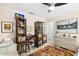 Bedroom with two bookshelves and wicker dresser at 2322 Riverbluff Pkwy # V250, Sarasota, FL 34231