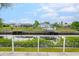 Scenic view of the canal from the property, showing boat docks and neighboring homes at 2322 Riverbluff Pkwy # V250, Sarasota, FL 34231