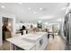 Bright kitchen with marble island and stainless steel appliances at 2322 Riverbluff Pkwy # V250, Sarasota, FL 34231