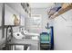 Laundry room with washer, dryer, and extra storage at 2322 Riverbluff Pkwy # V250, Sarasota, FL 34231
