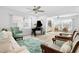 Relaxing living room with piano and comfy seating at 2322 Riverbluff Pkwy # V250, Sarasota, FL 34231